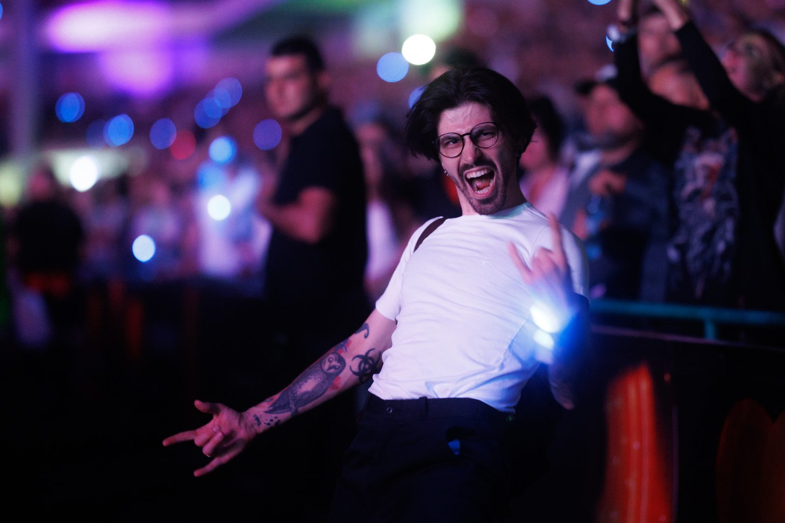 A fan rocking out in the front row